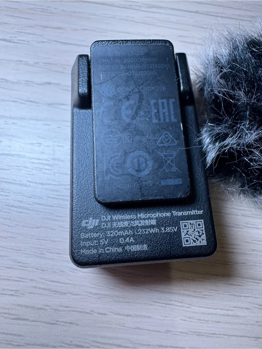 DJI Mic 1 transmitter and Gray Furry Wind Muff